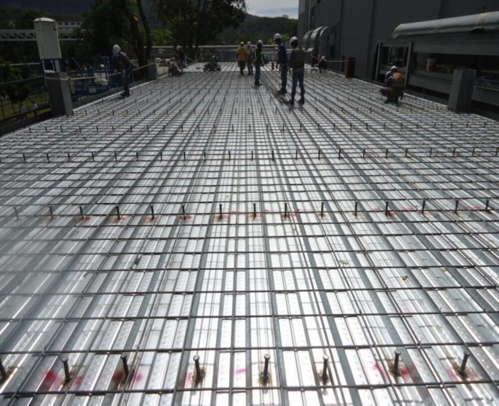 Reinforced concrete rebar mesh for a second floor deck structure